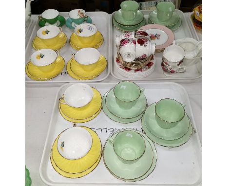 A set of six Shelley cups, saucers and side plates in yellow with petal relief decoration, two other white Shelley pieces, a 