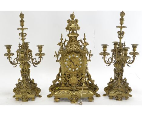 Late C19 French gilt brass mantle clock, with garniture by Ch Levassort, Paris, no. 468. In running order. H62cm 