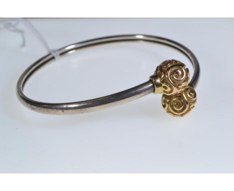 Yellow metal & silver bangle, unmarked, yellow metal tests positive for 9ct gold, 10.43 grams 