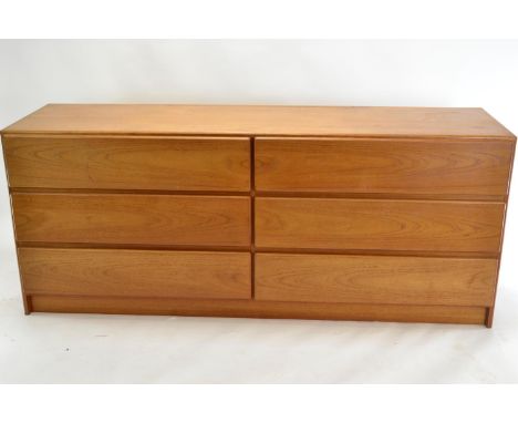 6 drawer teak lowboy, in the manner of Scan Col, Denmark. Includes possible marriage mirror, marked MFG, Canada. W183cm d52cm