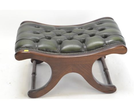 Leather button crossover stool. w70cm d43cm h40cm 