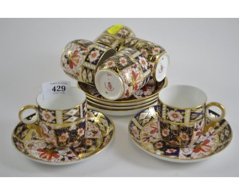 Set of six Royal Crown Derby imari pattern coffee cans & saucers, dated 1907-8Some rubbing to gilt.One saucer dated 1907 & re