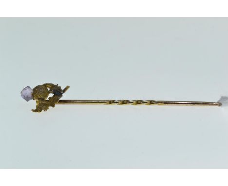 9ct gold twist thistle stick pin with amethyst coloured cut stone top, 1.1 gram 