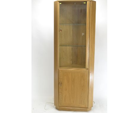 Ercol model 2138 elm & glass corner cabinet. H194cm W53cm 