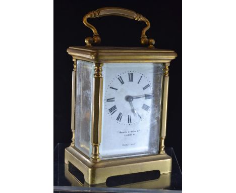 French brass cased carriage clock, retailed by Mappin & Webb, with key, height inc. handle 14.5cm, two glass panels AFOne sid