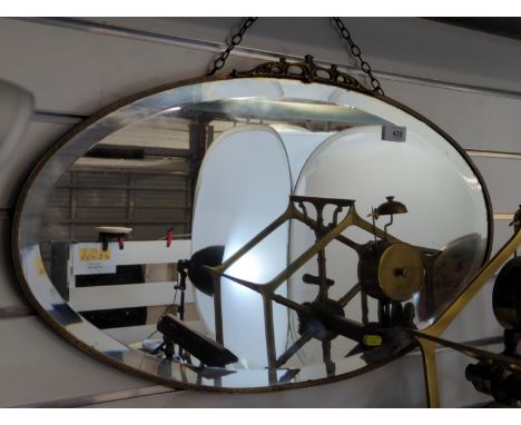 Vintage oval bevelled mirror with fine gilt frame 69cm wide