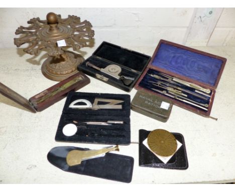 A selection of Victorian and later pen stands; writing and drawing related equipment; a stereoscopic viewer; a set of soverei