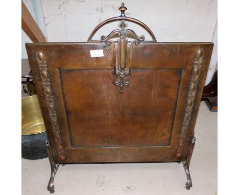 An Edwardian copper firescreen; a copper kettle and metalware