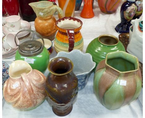 A Carltonware biscuit barrel; Sylvac items; vases; jugs; etc.