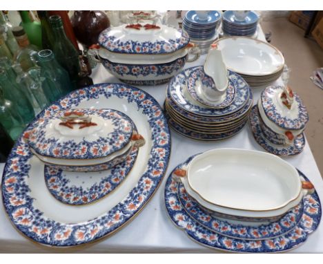 A set of 3 early 20th century Royal Worcester graduating tureens and similar dinnerware, including meat platters