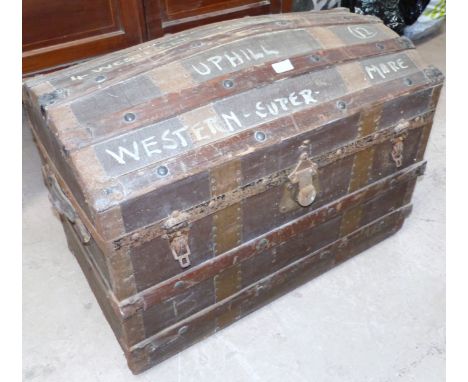 A metal bound domed top trunk