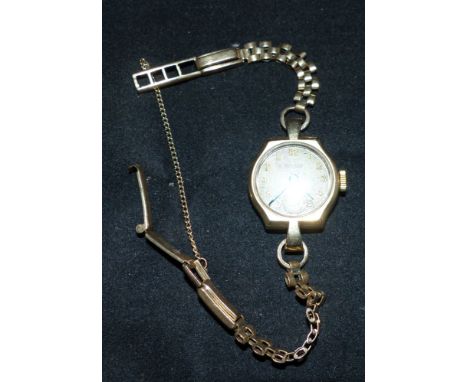 A ladies Rotary 9 carat hallmarked gold wristwatch on gold bracelet, stamped '375' (net 10.5 gm)