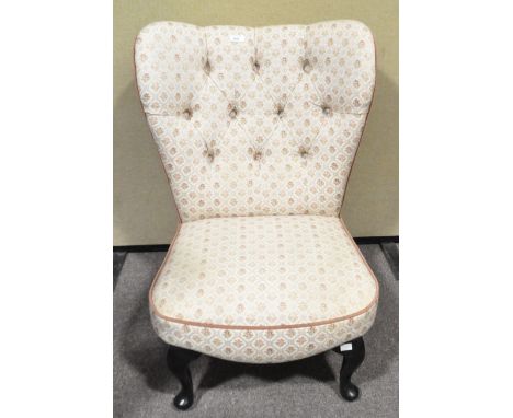 A button back nursing chair