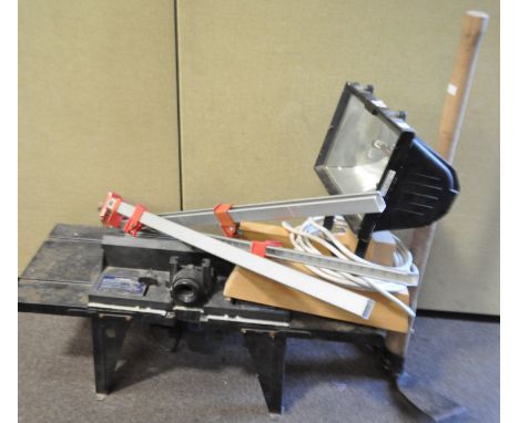 Search light along with wooden bench, three clamp and pick axe