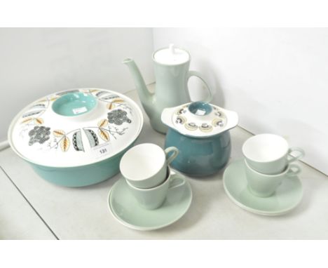 A collection of Poole pottery, lidded dishes, coffee pot and cups and saucers