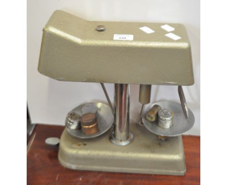 A set of banking scales and weights