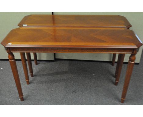 A pair of console tables
