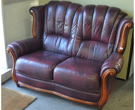 A wine coloured sofa