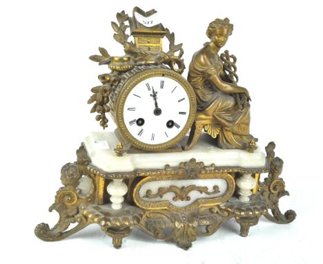 A French speltar and alabaster mantel clock