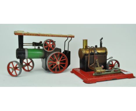 A Mamod steam traction engine and a steam wheel engine