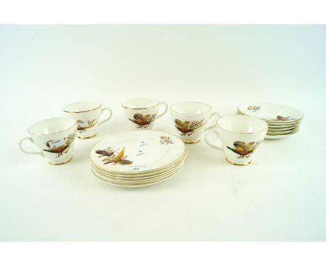 A Fenton China Company set of six cups, saucers and cake plates, all decorated with pheasant designs