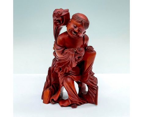 A wood carving of Gama Sennin (Chinese Hou Xiansheng) and his three-legged toad. Dimensions: 4"L x 3"W x 6"HCondition: Age re
