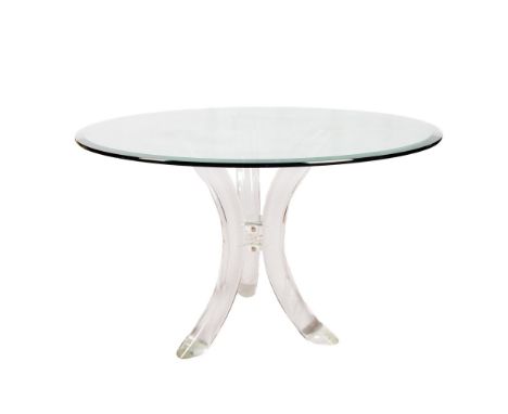 Stunning minimalist architectural and modern table composed of three thick and gracefully curved lucite legs that support a 1