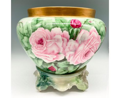 Rose pattern design on green background with banded gilt rim. This item has a hand painted porcelain stand included: 9"L x 9"