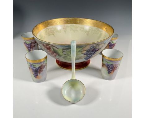 Footed W.G. &amp; Co. porcelain punch bowl decorated with hand-painted purple, green and red grapes, green leaves, gold rim, 