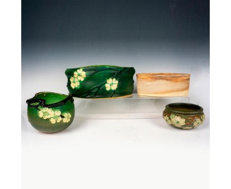 Includes 2 hanging wall planters; all decorated in Roseville's Dogwood pattern with raised Dogwood blossoms on a green ground