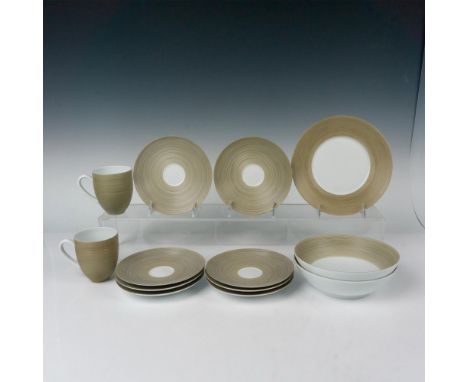 Contemporary design with khaki green rim over white porcelain. Pieces included: 2 Coupe soup bowls 2.25"H x 7.5" dia., 1 dess