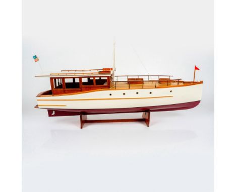 Assembled model kit of the popular cruiser from the late 20's. Features all individually planked construction with teak looki
