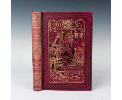 First edition volume from Hetzel's French edition A l'Obus, type 2, fushia cover from the Voyages Extraordinaires series by J