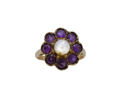 A cultured pearl and amethyst cluster ring, head diameter 16mm, size N, tested as 9ct gold, weight 3.6g