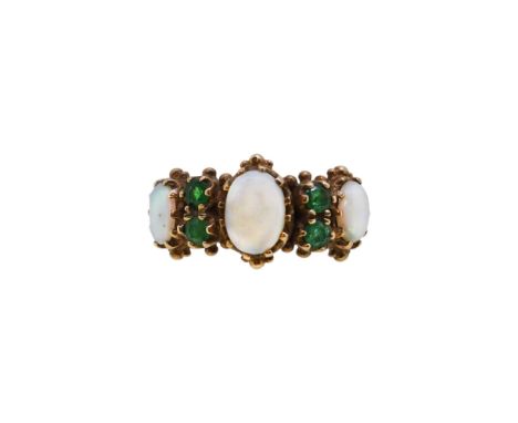A 9ct gold opal and emerald ring, width 11.4mm, size O, hallmarked 9ct gold, weight 4.1g