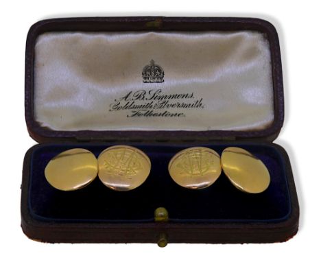 A pair of 15ct gold cufflinks, oval links, dimensions 20 x 15mm, each with a monogram, chain connection, hallmarked 15ct gold