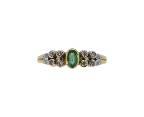 An 18ct gold emerald and diamond ring, width 5.7mm, size L½, hallmarked 18ct gold, weight 3g