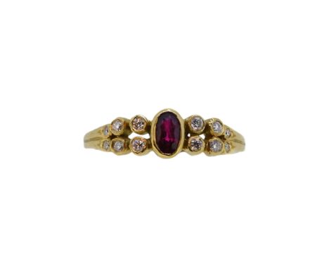 An 18ct gold ruby and diamond ring, width 5.7mm, size L, hallmarked 18ct gold, weight 3g