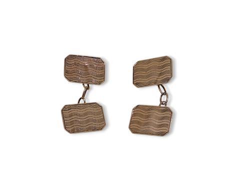 A pair of 9ct gold cufflinks, octagonal panels with engine turned decoration, hallmarked 9ct gold, weight 4.1g