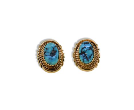 Mark Yazzie - A pair of turquoise ear studs, dimensions 2 x 1.5cm, post and scroll fittings, stamped '14K', weight 7.5g