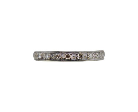 A diamond set full eternity ring, size K, width 2.7mm, tested as 18ct gold, weight 2.8g