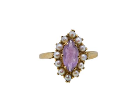 A 9ct gold amethyst and pearl ring, head dimensions 16.6 x 11.3mm, size L½, hallmarked 9ct gold, weight 2.5g