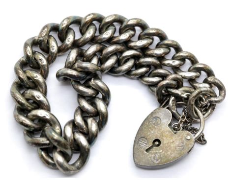 Hallmarked silver charm bracelet with padlock clasp and safety chain, each link stamped. 40g.P&amp;P Group 1 (£14+VAT for the