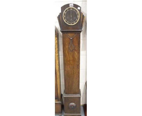 Vintage medium sized oak cased longcase clock with mechanical movement and Westminster chime. This lot is not available for i