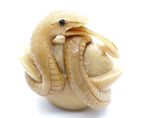 Vintage Tagua nut hand carved snake in a basket netsuke, signed. P&P Group 1 (£14+VAT for the first lot and £1+VAT for subseq