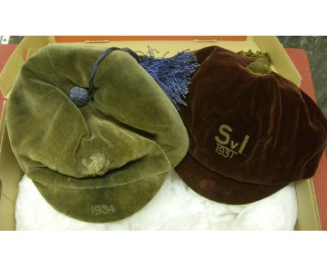 A pair of football caps, a claret cap embroided 1931 S v I, and a Green/Yellow cap embroided with the England Lion, dated 193