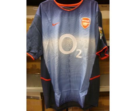 Arsenal, a match worn blue away short, as worn by Kolo Toure, number on reverse, with a signed note from Toure confirming tha