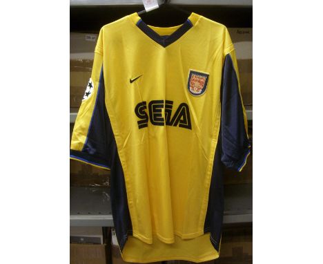 Arsenal, a match worn yellow away shirt, as worn by Lee Dixon, Number on reverse, with a signed note from Lee, confirming tha