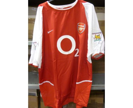 Arsenal, a match worn home shirt as worn by Dennis Berkamp, number on reverse, with a signed note from Dennis confirming that