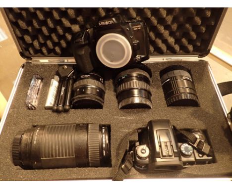 Boxed Minolta digital camera with extra lenses